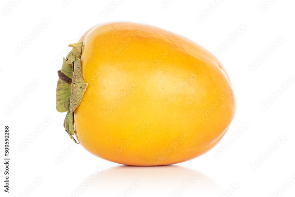 One whole sweet orange persimmon isolated on white background