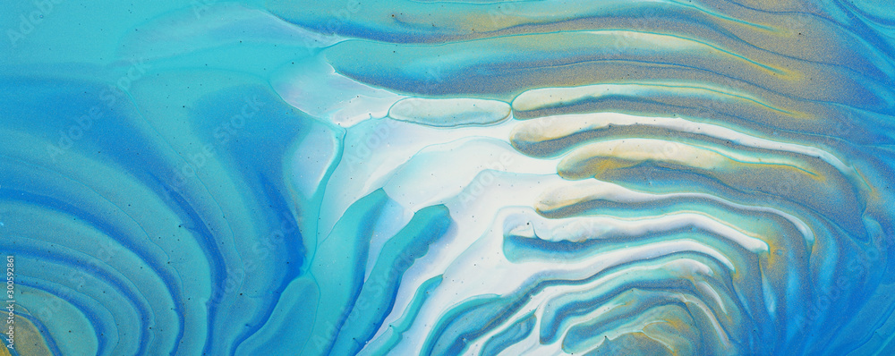 art photography of abstract marbleized effect background. blue, mint and gold creative colors. Beautiful paint