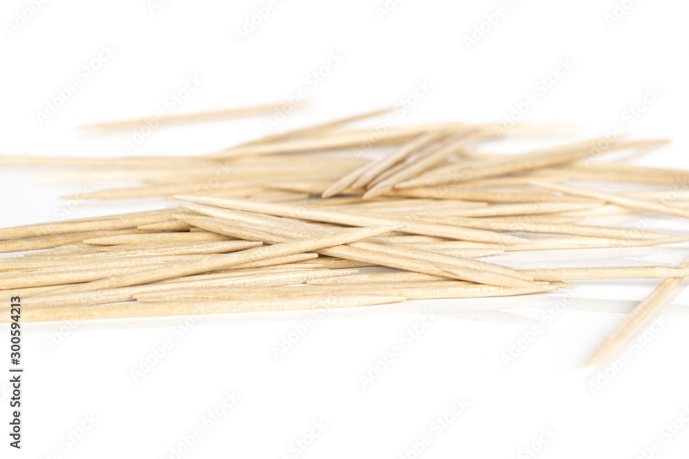 Lot of whole disordered wooden brown toothpick isolated on white background Lot of whole disordered wooden brown toothpick isolated on white background