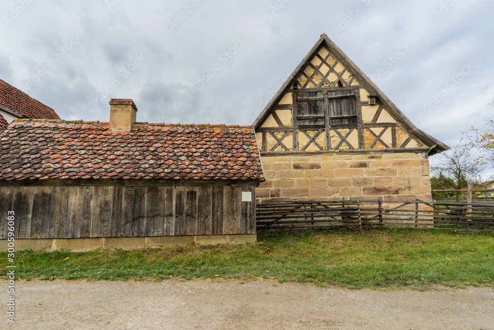 Bad Windsheim, Germany - 16 October 2019: View from a half timbered house in a german village. Bad Windsheim, Germany - 16 October 2019: View from a half timbered house in a german village.