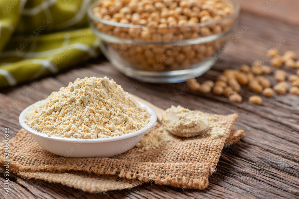 Product of soy flour in bowl with soybean, Kinako flour. Product of soy flour in bowl with soybean, Kinako flour.