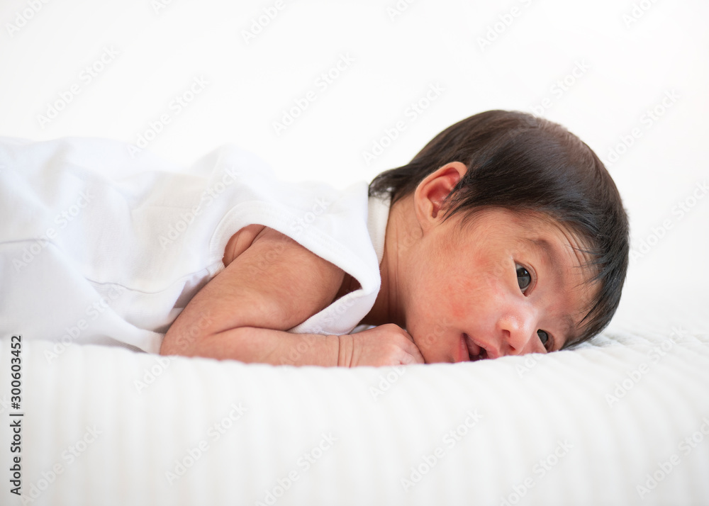 newborn baby sleep in bed on white background newborn baby sleep in bed on white background