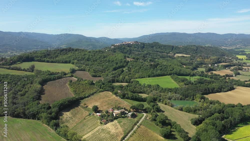 Aerial view of green hills and countryside in Italy Aerial view of green hills and countryside in Italy