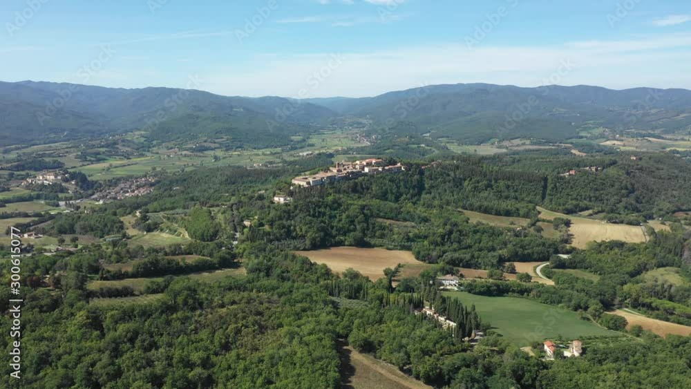 Aerial view of green hills and countryside in Italy Aerial view of green hills and countryside in Italy