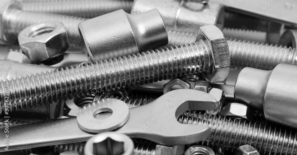 Abstract industrial background. Bolts and nuts. Many metalware. Abstract industrial background. Bolts and nuts. Many metalware.