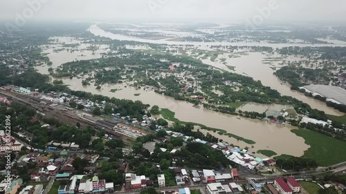 High-angle view of the Great Flood, Meng District, Ubon Ratchathani Province, Thailand, on September 13, 2019, is a photograph from real flooding. With a slight color adjustment