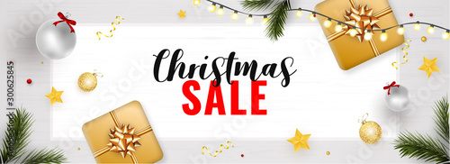 Christmas Sale header or banner design with top view of gift boxes, baubles, stars, pine leaves and lighting garland decorated on white texture background.