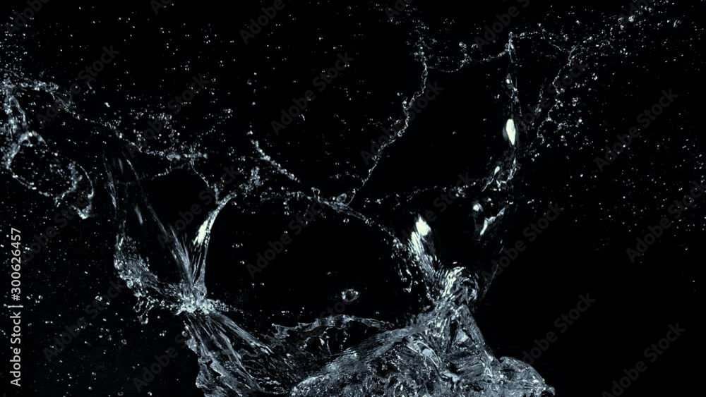 Super Slow Motion Shot of Water Splash at 1000fps Isolated on Black Background. Super Slow Motion Shot of Water Splash at 1000fps Isolated on Black Background.