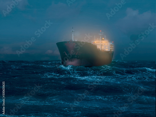 Illuminated tanker on the sea during the night
