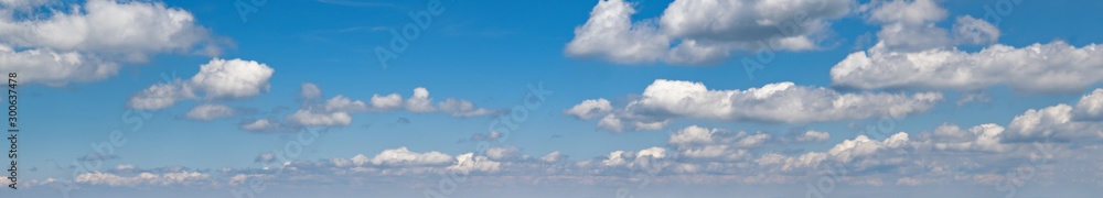 Blue sky with clouds (wide background panorama). Blue sky with clouds (wide background panorama).