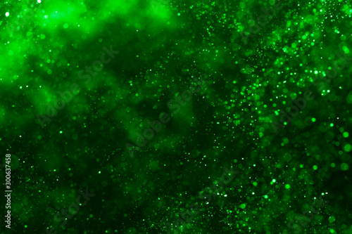 Abstract Green bokeh defocus glitter blur Background.