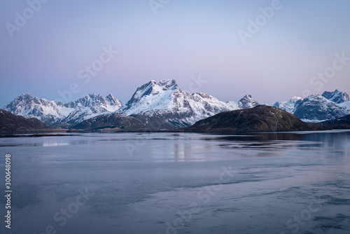 Snowy peaks in Lofoten island at night. Norway, travel, arctic, spring, cold, landscape, nature, trip, visit concept.