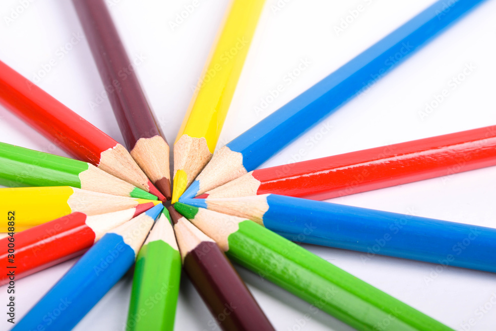 Many different colored pencils on a white background with a place for text and cory space . Many different colored pencils on a white background with a place for text and cory space .