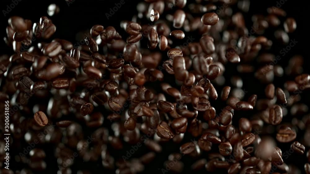 Super Slow Motion Shot of Exploding Premium Coffee Beans at 1000fps. Super Slow Motion Shot of Exploding Premium Coffee Beans at 1000fps.