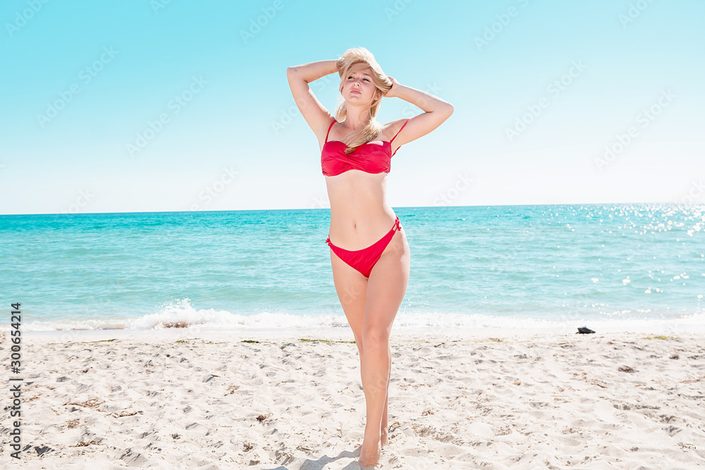 Portrait of blonde in swimsuit at the sea. Portrait of blonde in swimsuit at the sea.