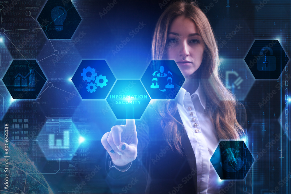 Business, Technology, Internet and network concept. Young businessman working on a virtual screen of the future and sees the inscription: Information security Business, Technology, Internet and network concept. Young businessman working on a virtual screen of the future and sees the inscription: Information security