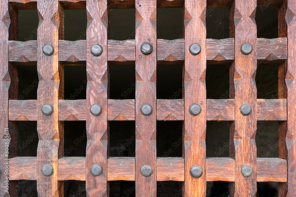 wooden grill protects the entrance to the basement cellar wooden grill protects the entrance to the basement cellar