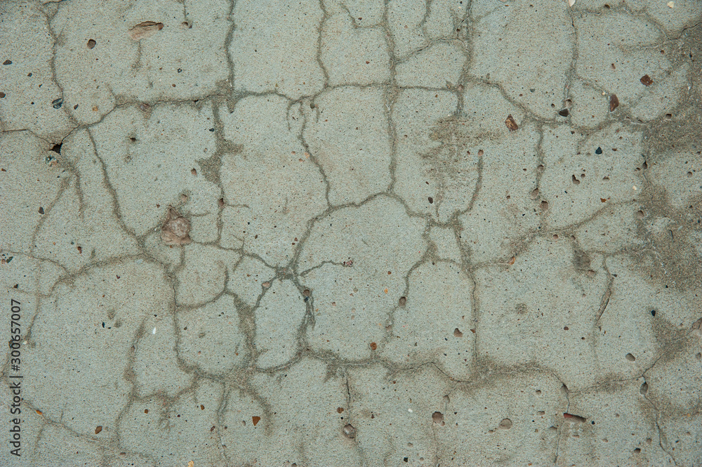 Obraz premium Abstract background. Old rough texture, gray concrete wall with cracks. Background, structure.
