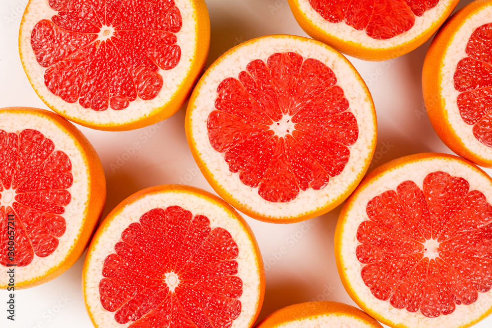 Grapefruit red juicy slices background. top view Grapefruit red juicy slices background. top view