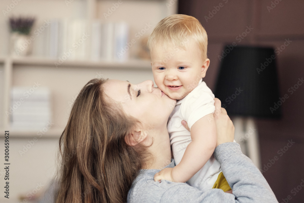happy mother hugs son at home and kiss, feelings, relationship of mother and child, happy mother hugs son at home and kiss, feelings, relationship of mother and child,