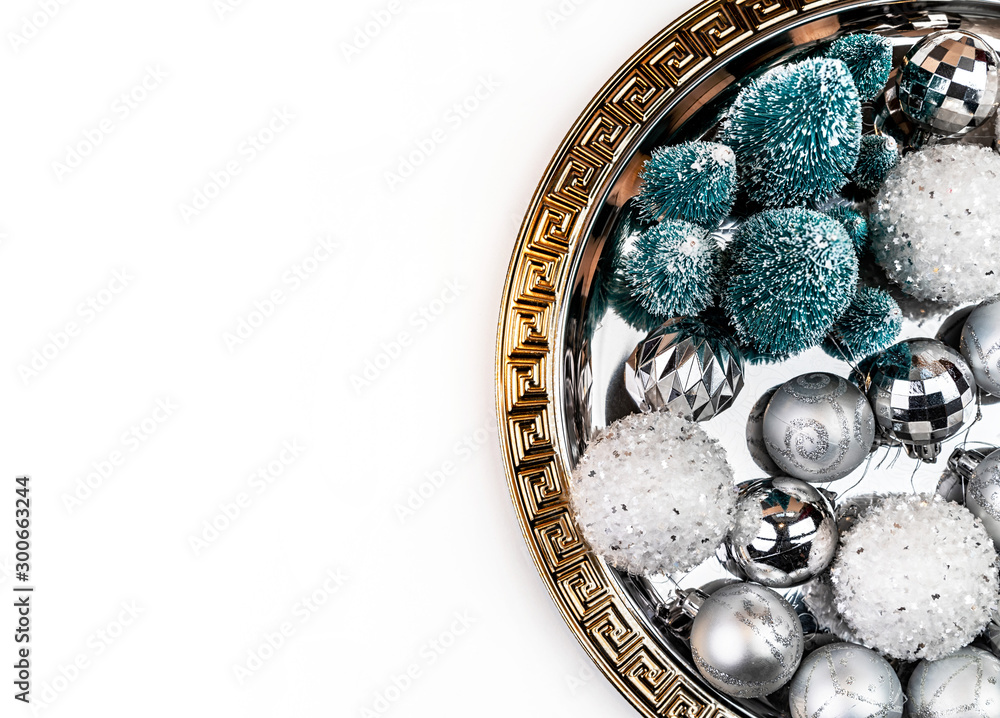 Christmas decorations on silver and gold tray top view flat lay with copy space Christmas decorations on silver and gold tray top view flat lay with copy space
