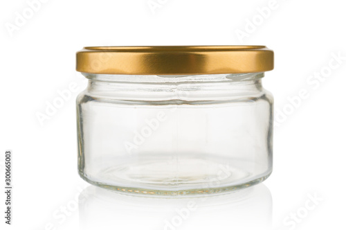Empty glass jar close up on white background