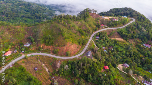 Aerial drone image of Beautiful Rural with local house and green forest in surrounding