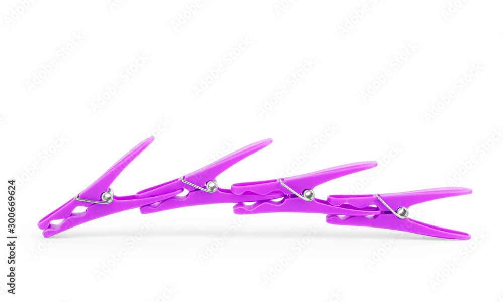 plastic clothespins on a white background plastic clothespins on a white background