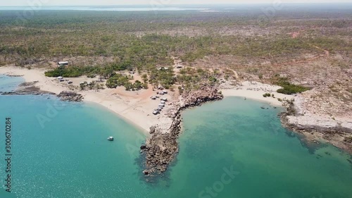 Aerial, remote campground on remote tropical Northern Australia Kimberley coast, pullback photo