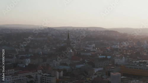 Wallpaper Mural Aerial drone shot of the beautiful city of Cluj-Napoca in Romania while sunset Torontodigital.ca