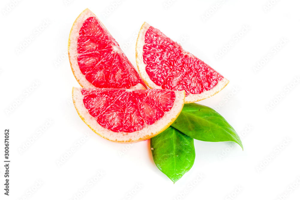 Whole and sliced grapefruit isolated on white background Whole and sliced grapefruit isolated on white background