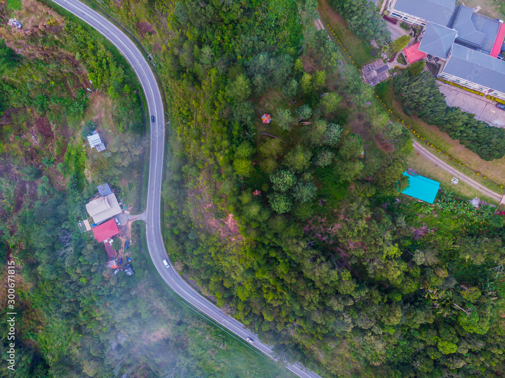 Top view of the the rural rainforest asphalt road in Sabah, Borneo