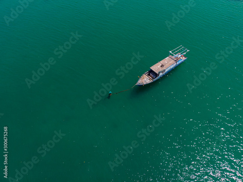 Beautiful landscape scene fisherman wooden boat with turquoise sea water view from bird eyes at Kuala Abai, Kota Belud, Sabah, Borneo