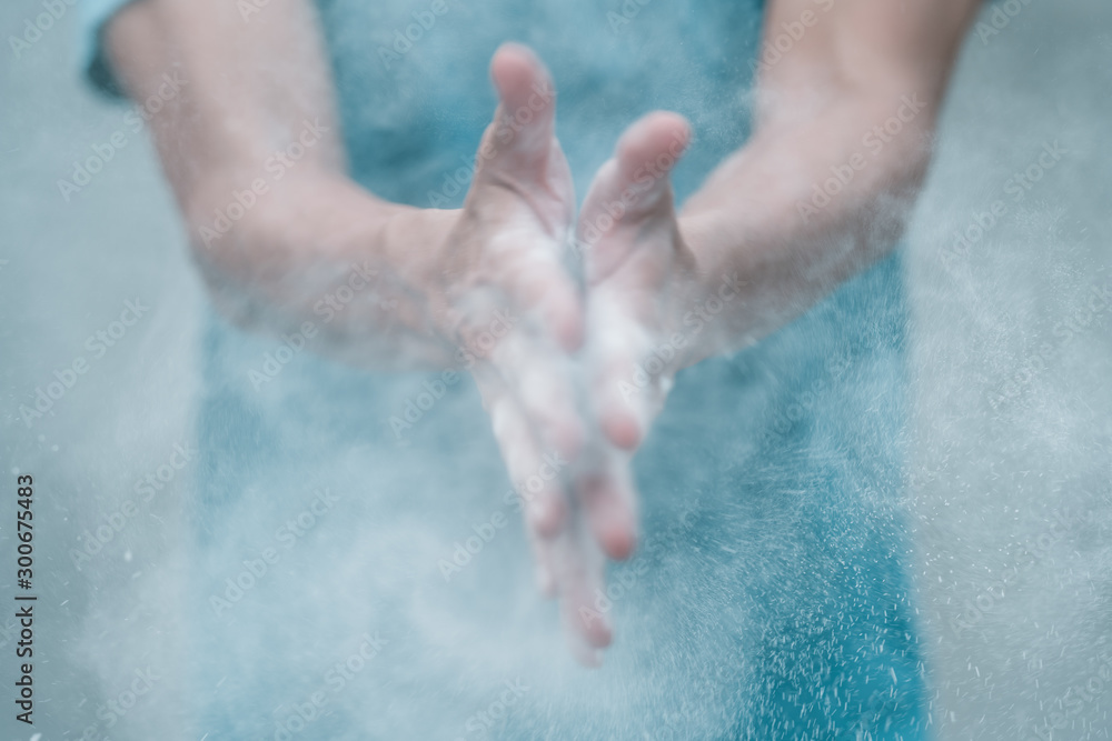 Powders on the two hand.