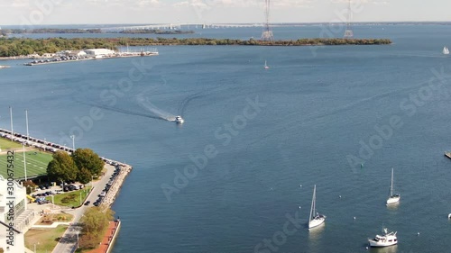 Aerial pan of Spa Creek, Severn River, boats, yachts, Naval Academy fields, bridge photo