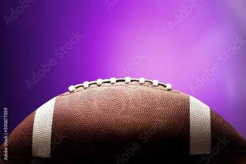 American football ball on background