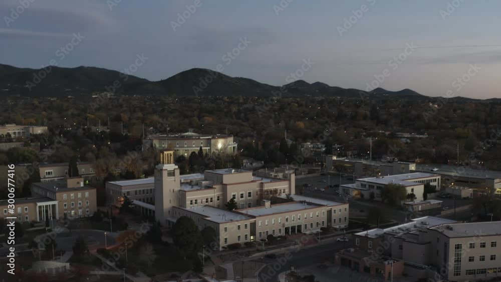 Drone shot flying around a large building found in the hills of Sante Fe, New Mexico. Shot during golden hour. Drone shot flying around a large building found in the hills of Sante Fe, New Mexico. Shot during golden hour.
