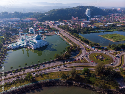 Bird eyes view of beautiful Kota Kinabalu mosque, famous landmark in Kota Kinabalu with clear blue sky during sunny day at Kota Kinabalu, Sabah, Borneo