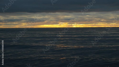 Sunset over the sea in Halmstad, Sweden, during winter time photo