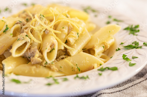 Penne lisce pasta with tuna and lemon.