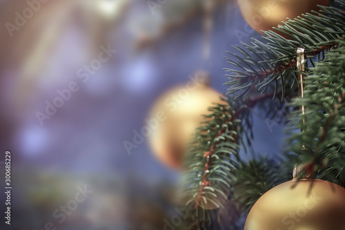 Christmas decorations in bright blue red gold and white shiny and shimmering colors with Christmas lights with blurred background. 