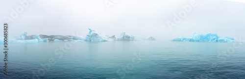 Fotografia, Obraz Fragments of iceberg in sea water. Iceland north sea