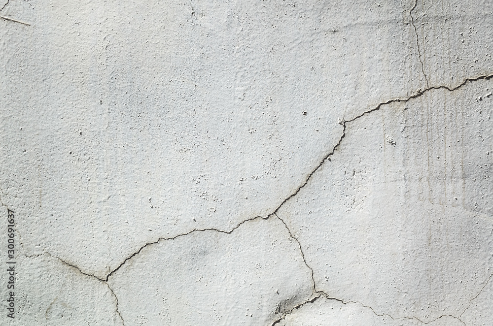Obraz premium cracked and aged gray wall background