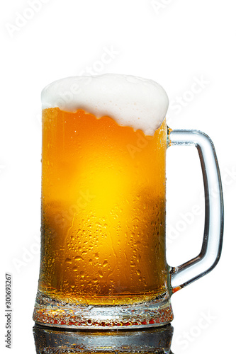 cold mug of beer with foam isolated on white background