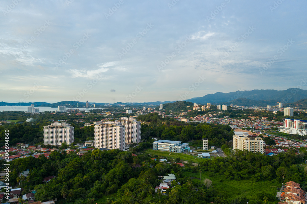 Aerial image of beautiful Kota Kinabalu City during beautiful twilight sunset on Sabah, Malaysia