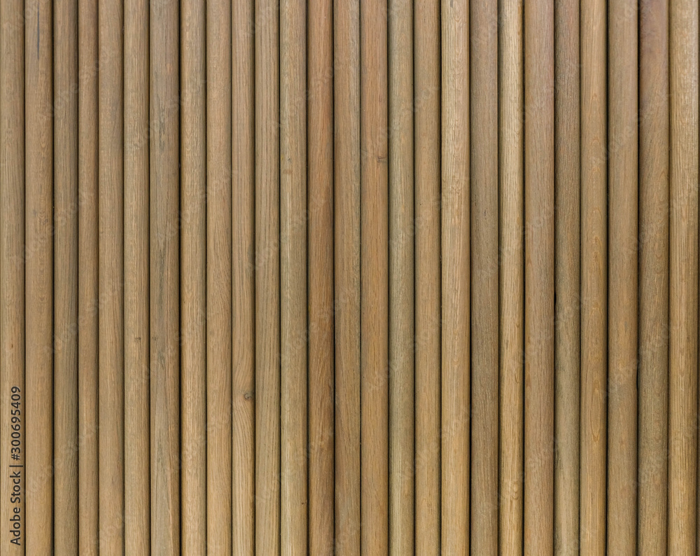 Fototapeta premium Stara bambusowa deska z naturalnego brązu w tonacji tekstury ogrodzenia na ścianę tła, abstrakcyjna powierzchnia wzoru dla dowolnego projektu.