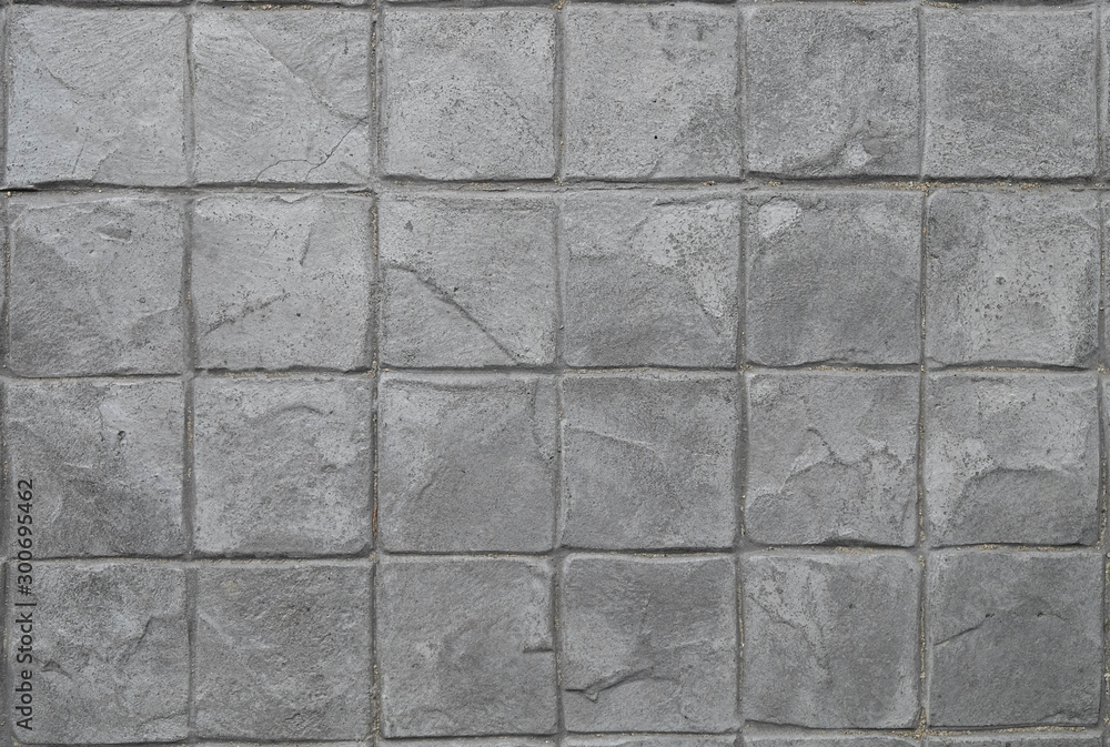 Naklejka premium Old Cement Stamp square Pattern grey tone, Rock wall, close up.Abstract Texture background. Grey Stone block pattern Great details, surface for any design.