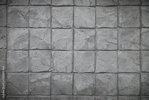 Vignette Cement Stamp square Pattern grey tone, Rock wall, close up.Abstract Texture background. Grey Stone block pattern Great details, surface for any design.