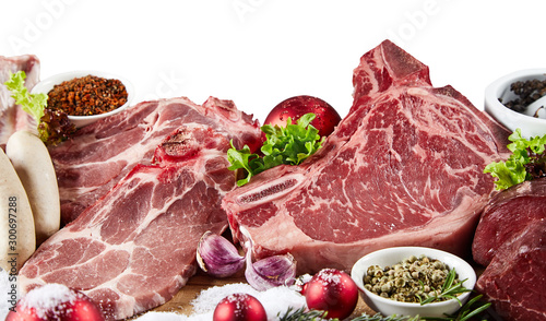 Raw red meat and ingredients for holiday cooking