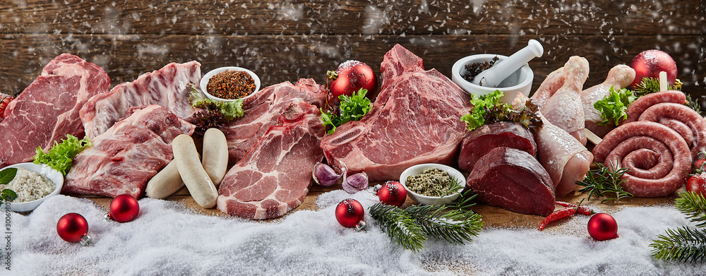 Christmas banner with assorted raw meat for a BBQ - obrazy, fototapety, plakaty 